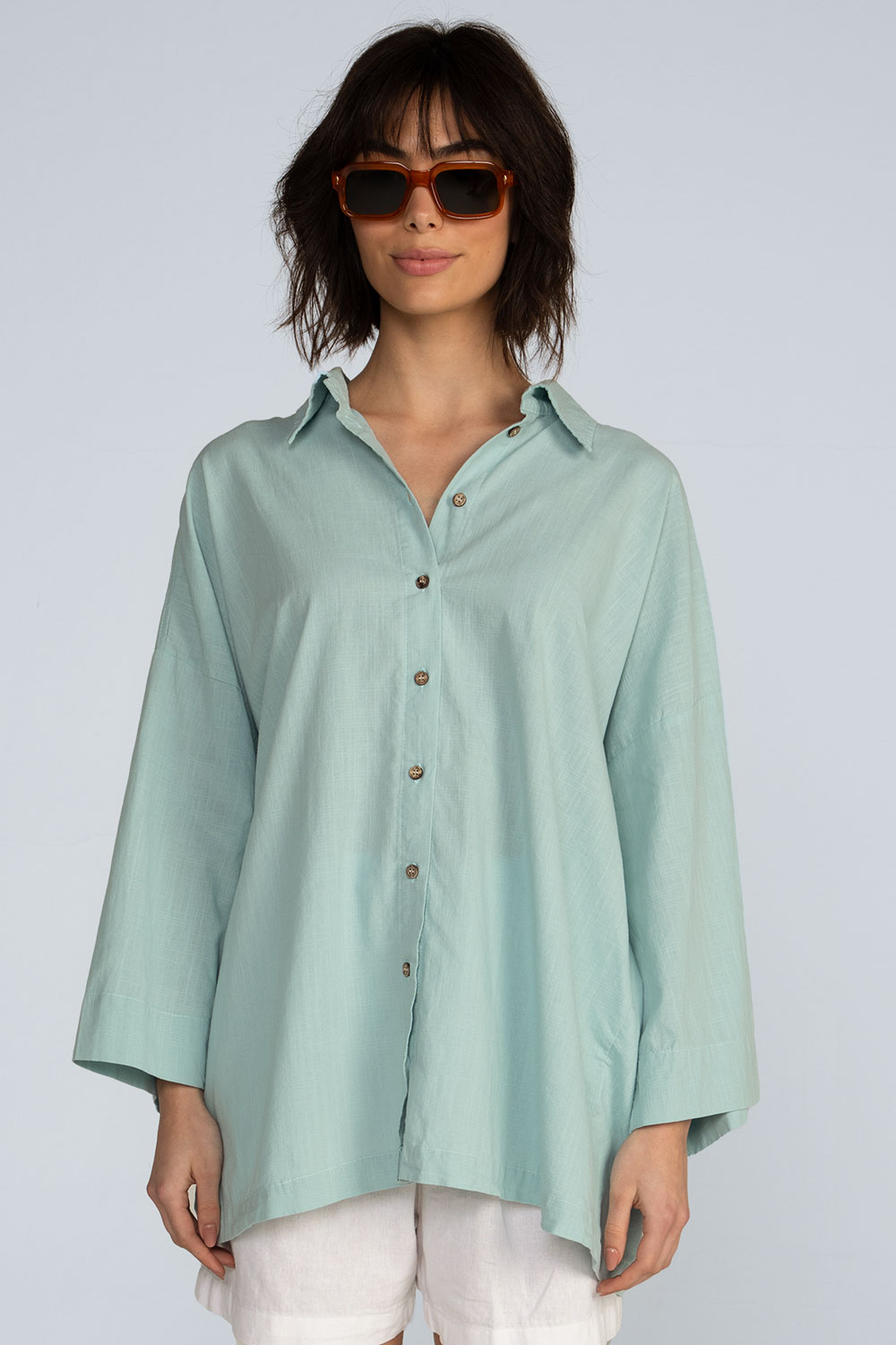 Camisa ampla Camisa ampla